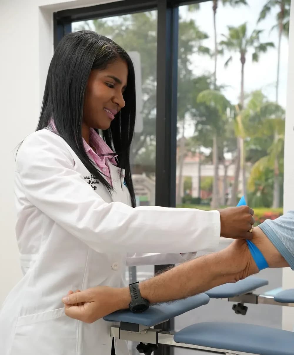 Dr. Bruna Jebelev preparing a blood draw