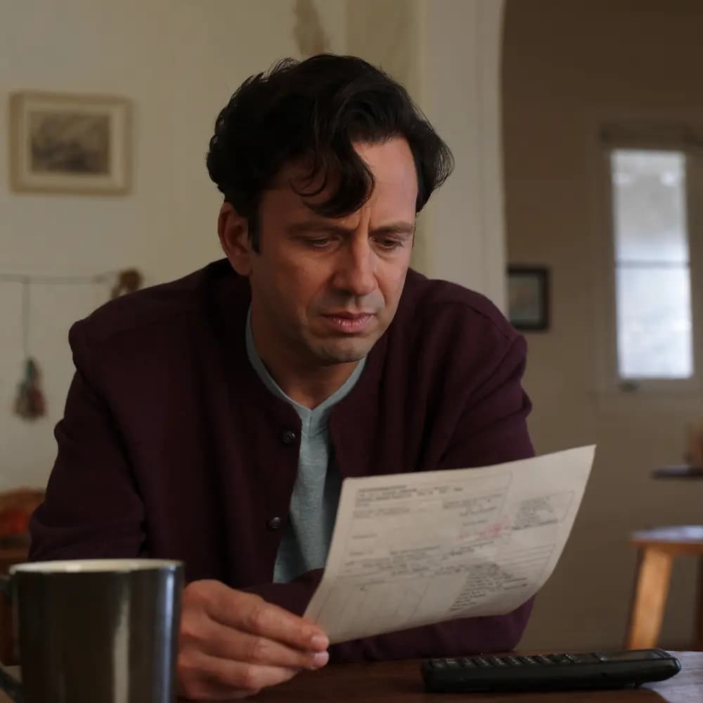 Man looking at a medical bill